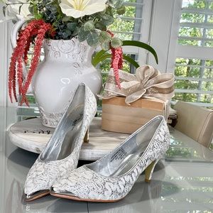 Wild Rose Silver/white size 11 heels.